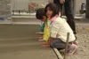 A group of CCS Early Learning children christen the new facility Monday by leaving their handprints in the fresh cement. JACOB MANN/Frontiersman