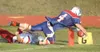 North Pole’s Jared Isaacson, right, extends his body for a
touchdown despite being taken down at the end of a long run by
Wasilla’s Pat Chafin during the second quarter Friday evening at
Patr