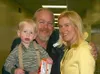 Newly elected MEA board member Peter Burchell, of Wasilla,
receives armloads of congratulations from his daughter, Heidi
Valantas, and his grandson, Cole Valantas, 3. DAWN De
BUSK/Frontiersma