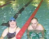 CHRIS GILLOW/Frontiersman Melanie Flowers and Jeremy Hartman
take a breather Monday during a vigorous training swim at Wasilla
Pool. Both athletes will travel to China for the 2007 Special
Ol