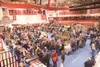 Gun show enthusiasts roam Wasilla High School Saturday during
the Wasilla Hockey Boosters annual gun show. More than 150 vendors
are on hand selling everything from guns and bullets to scente
