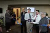 Alan Craft, Mark Palmer and Jarom Schmidt cut the ribbon on a new Urgent Care facility in Palmer with Mayor Edna DeVries.JPG