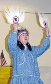 Kathy King performs a traditional Native Alaskan dance last
week. King is a member of the Miracle Drummers and Dancers. Photo
by Casey Ressler/Frontiersman.