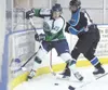 Alaska forward Grant Dye moves the puck out of the corner during
the Avs’ 3-1 win over the Wenatchee Wild last week. (ROBERT
DEBERRY/Frontiersman) Robert DeBerry