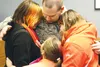 U.S. Air Force Tech. Sgt. John Arsenault surprises his daughters at their Palmer schools Jan. 30, 2015, after a nine-month deployment to South Korea. HEATHER A. RESZ/Frontiersman