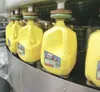 Matanuska Creamery gallon milk jugs are filled and capped for delivery to local stores at the creamery’s valley location along the Palmer-Wasilla Highway. ROBERT DeBERRY/Frontiersman