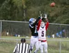 Palmer wide receiver Carson Helm and North Pole defensive back Alex Garcia jump for a ball in the back of the end zone during Palmer’s 45-20 win over the Patriots Friday. Helm made the catch,