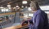 Mat-Su Central Principal Stacey McIntosh explains the school's new facility and its details during a tour last week. J. Dsvid McChesney/Frontiersman