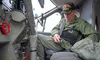 Jeff 'Bic' Bickerton, of Atlanta, Georgia, formerly of the Army's 18th Aviation Co., reorients himself for the first time in more than 50 years, to K2 Aviation's Twin Otter, in Talkeetna. He 
