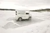 ROBERT DeBERRY/Frontiersman Deemed the ‘Ice Breaker,’ this old
ice-cream truck sits on Big Lake waiting to break through the ice
as part of the Big Lake Chamber of Commerce’s Big Lake Ice
Cla