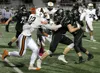 Colony junior Eric Christy runs up the field during a 14-10 loss to West Anchorage in the Division I quarterfinals. Of the eight games during the first weekend of the Alaska prep football pla