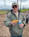 Nenana farmer Tarn Coffey with Gaspe corn. Tim Bradner/For the Frontiersman