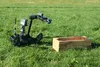 A remotely operated Common Robotic System – Individual uses its extendable arm to drop a simulated grenade into a box during training on Nov. 9, 2022, at Fort Indiantown Gap, Pa. The CRS-I is