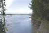 ROBERT DeBERRY/Frontiersman Service road located behind the
Rival Motocross track in the Butte has been completely eroded away
by the Matanuska River.