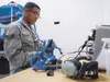 Senior Airman David Texada, an aircrew flight equipment journeyman with the 3rd Operations Support Squadron, tests a 358-Series Quick Don Mask Aug. 16 at Joint Base Elmendorf-Richardson. C-17