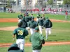 Mat-Su Miners players charge out of the dugout to congratulate
pitcher Scott Sitz on hurling a no-hitter Friday, the team’s second
of the season. Photo courtesy Mat-Su Miners