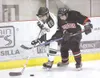 ROBERT DeBERRY/Frontiersman Colony Knight Trever Nickerson moves
the puck down the ice as Houston Hawk Emily Hundley attempts to
gain control during Friday's game at the Curtis C. Menard II
M