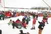 Wasilla's Matt Hayashida prepares to leave the Iditarod Trail
Sled dog Race starting chute on Willow Lake Sunday. Thousands of
spectators gathered to give the record field of 96 mushers a goo