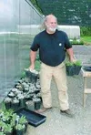Craige Baker says farming always has been, and always will be,
an important part of his life. He and his wife, with the help of
their three children, built Gray Owl Farm out of an old Matanus