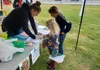 SNAP-Ed nutrition educator, Adair Harman leads a cooking demonstration at Nunley Park in downtown Wasilla. Jacob Mann/Frontiersman