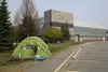 Residents displaced by the McKinley Fire have been staying at an evacuation center set up at the Menard Arena. Some have been sleeping in tents and motorhomes outside the building. Jacob Mann