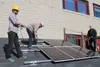 About 10 individuals are involved in a hands-on class/lab opportunity to become more well-versed in solar energy installation. Roger Williams of Colorado-based Solar Energy International, was