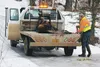 Alaska Moose Federation Executive Director Don Dyer secures a road-kill moose in December 2015. Frontiersman file photo