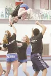 ROBERT DeBERRY/Frontiersman Members of the Denali All-Stars
cheer squad work on part of a routine Sunday at the Denali
Gymnastics Facility in Wasilla.