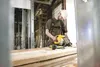 Greg Hollstein of Accurate Framing Systems works on the addition to the Mat-Su Borough building Monday afternoon. The new addition is scheduled to be finished around June. ROBERT DeBERRY/Fron