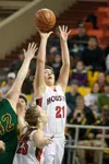 Houston junior forward Victoria Baybado shoots for two points during semi final competition at the ASAA/First National Bank 3A/4A State Basketball Championships at the Sullivan Arena in Ancho