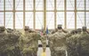 U.S. Air Force Maj. Christopher Hickman, 3d Aircraft Maintenance Squadron commander, salutes the 3d AMXS during the squadron's reactivation ceremony at Joint Base Elmendorf-Richardson, Alaska