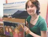 Karen Reed holds one of the original illustrations she did for
the new children's book 'Musk Ox Magic.' (ROBERT
DeBERRY/Frontiersman) Robert DeBerry