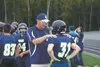 Redington head coach Tony Brooke talks to a player during the team's first varsity game in school history last year. This year, the second-year varsity program will feature a senior class for