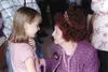 MARK SIMPSON/For the Frontiersman Mary Trice takes a moment to
talk to one of her family members during her 100th birthday
party.