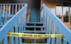 Caution tape blocks the stairs of a house on Woodruff Loop in Wasilla that was damaged by a fire over the weekend. Arson is suspected. ROBERT DeBERRY/Frontiersman.com