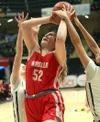 Wasilla's Layla Hays battles under the basket during a win over Mountain City Christian. Bruce Eggleston/matsusports.net