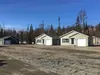 Pictured is a freshly constructed detached four-plex cluster off Knik-Goose Bay Road. The structures are placed on a small lot and usually rented out. While providing a source of needed renta