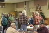 Palmer Historical Society members mingle after the presentations Wednesday. JACOB MANN/Frontiersman