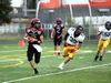 Houston quarterback Carter Seime rolls out of the pocket during a win over Homer. Bruce Eggleston/matsusports.net
