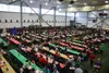 An estimated 5,000 people attend the 2019 Christmas Friendship Dinner at the Menard Sports Center. Jacob Mann/Frontiersman