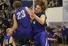 Palmer sophomore Clayton Southwick (23) and senior Michael Kluting (44) celebrate following a 55-47 win over rival Wasilla in the Northern Lights Conference championship game March 12, 2016, 