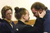 Shelby Harapat consoles her brother, Shane, after he received a
five-year sentence for a manslaughter conviction he received in the
shooting death of Kenneth Alcantra. Shane's mother, Judy, w