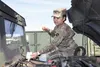 Spc. AnnaMarie Popoca, a transportation management coordinator assigned to 623rd Movement Control Team, 35th Combat Sustainment Support Battalion, checks the oil of her Humvee during routine 