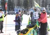 Newton Marshall of St. Anne, Jamaica, waves the flag of his homeland as he makes his way down the starting chute at the 2014 Iditarod Trail Sled Dog Race. HEATHER A. RESZ/Frontiersman.com