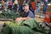 The 2019 cabbage weigh off winner, Walter Chastain, poses in front of his 77.5 pound cabbage. Jacob Mann/Frontiersman/