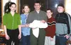 And baby makes six -- six Stinsons, that is. From left are
Sunday, Rachel, John, Avivah (in her daddy's arms), Jon and
Solomon. Photo by CASEY RESSLER/Frontiersman