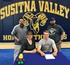 Aiden Jolley, a 2018 graduate of Susitna Valley, recently singed his letter of intent to wrestle at Concordia University in Minnesota. Pictured are Su Valley activities director Jim Sickler, 