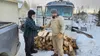 A military veteran and volunteer with the Alaska Warrior Partnership delivers firewood to a local veteran last winter as part of the nonprofit organization’s Winter Preparedness program. Phot