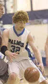 Palmer's Sean Niekamp grabs a loose rebound during Thursday's
game against the Wasilla Warriors. (ROBERT
DeBERRY/Frontiersman) Robert DeBerry