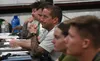 U.S. Air Force Master Sgt. Justin Adams, 36th Operation Support Squadron aircrew flight equipment superintendent, sits in a “train the trainer” course for aircrew chemical, biological, radiol